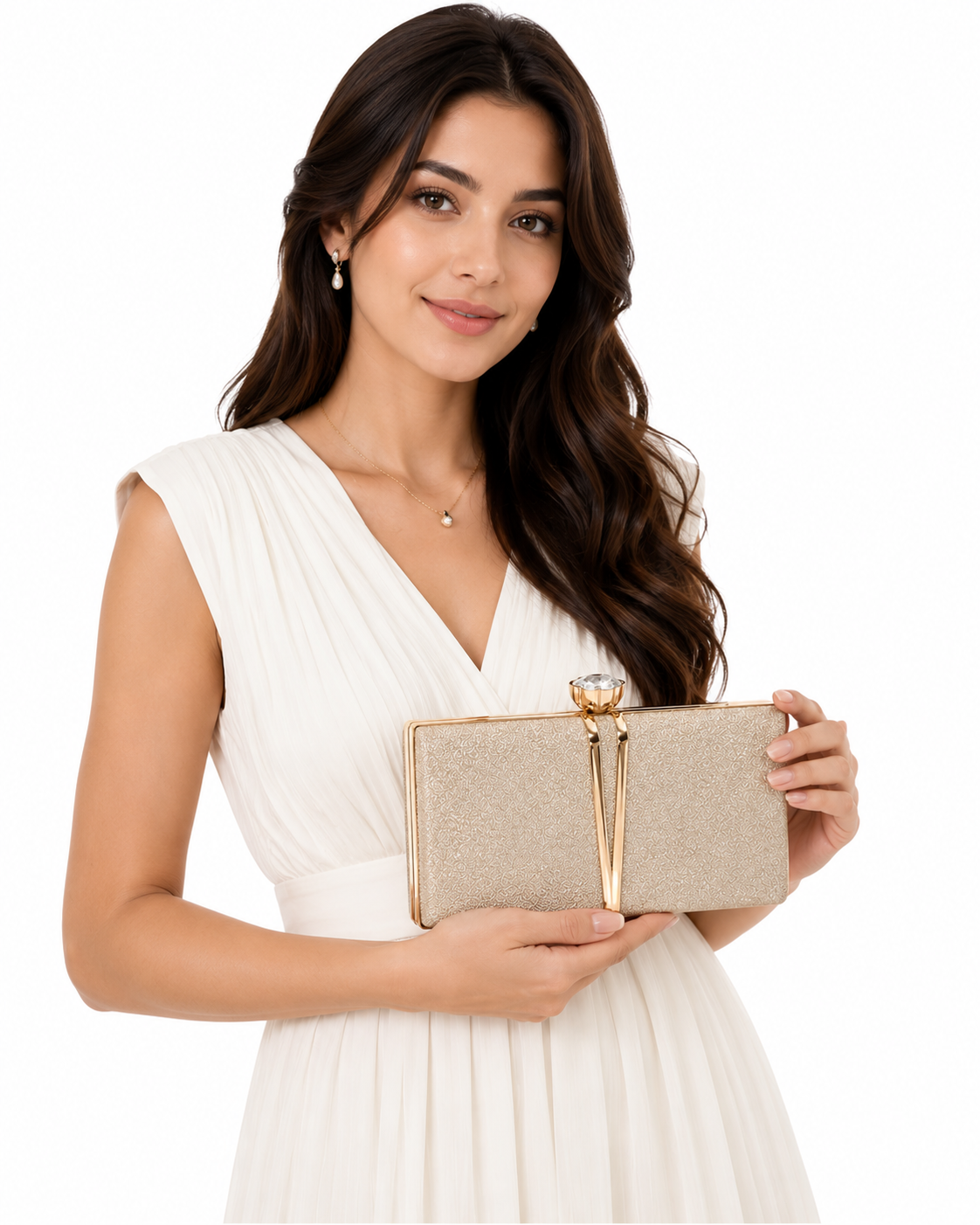 A woman in a white sleeveless dress holds a glittery champagne clutch bag with gold-tone hardware against a plain white background.