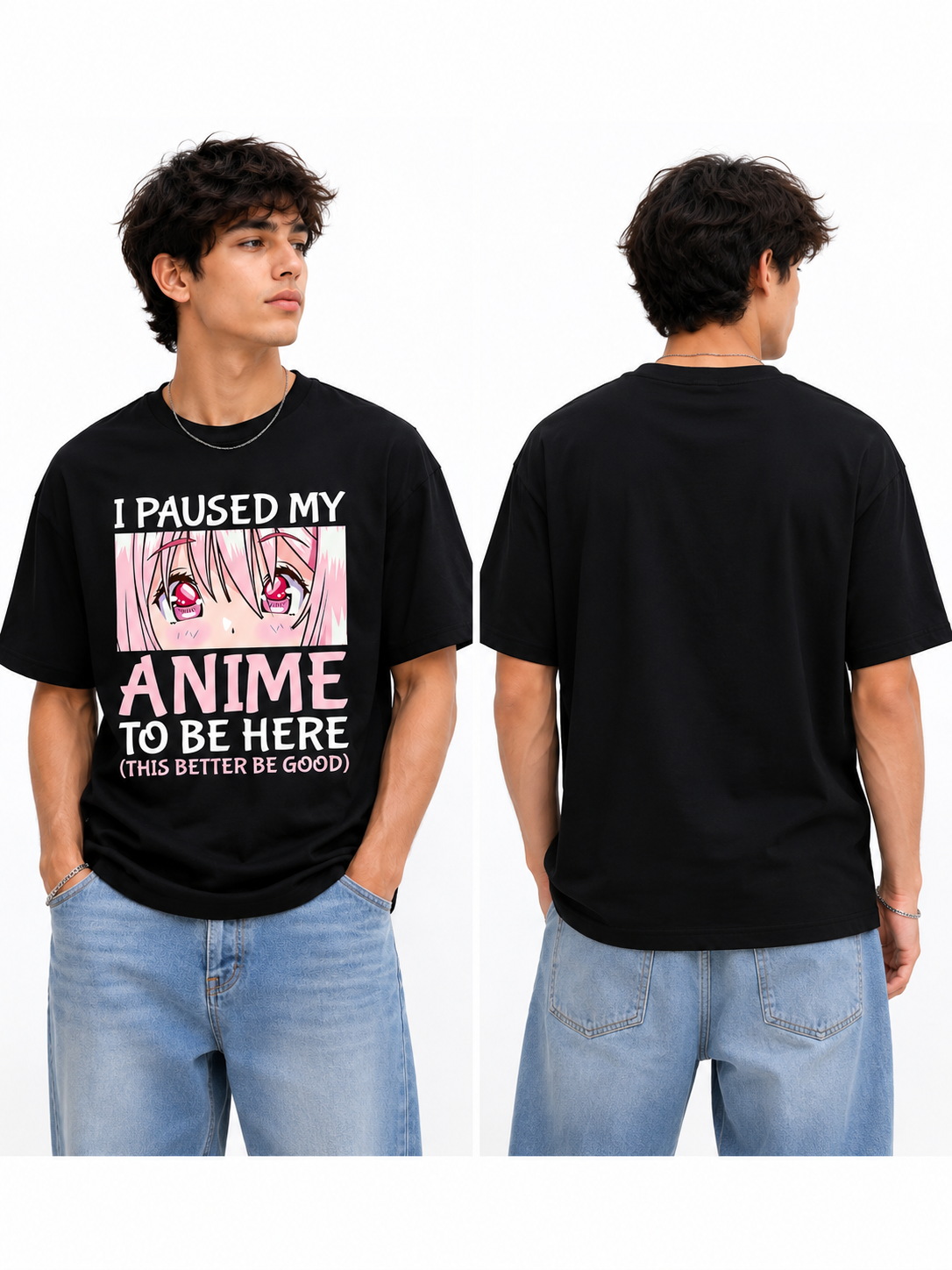 A black graphic t-shirt shown on a model from both the front and back views. The front features a graphic of an anime character with pink hair and the text 'I PAUSED MY ANIME TO BE HERE (THIS BETTER BE GOOD)'.